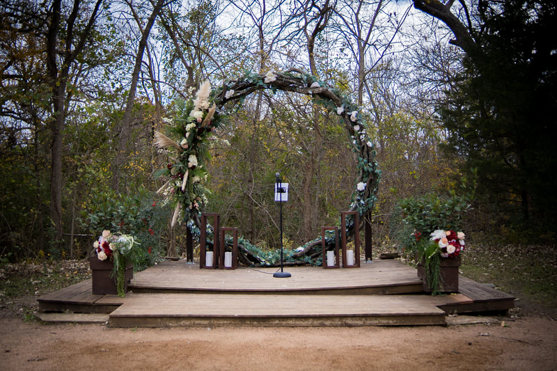 boho wedding arch with pampa grass and flowers